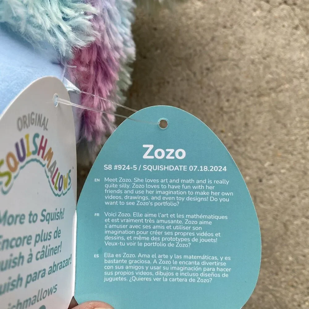 Squishmallows Zozo the Blue Rainbow Bigfoot with Flowers 10